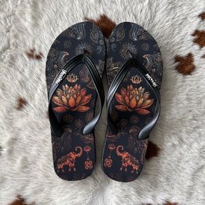 Black and Orange Flip Flops with Lotus Design